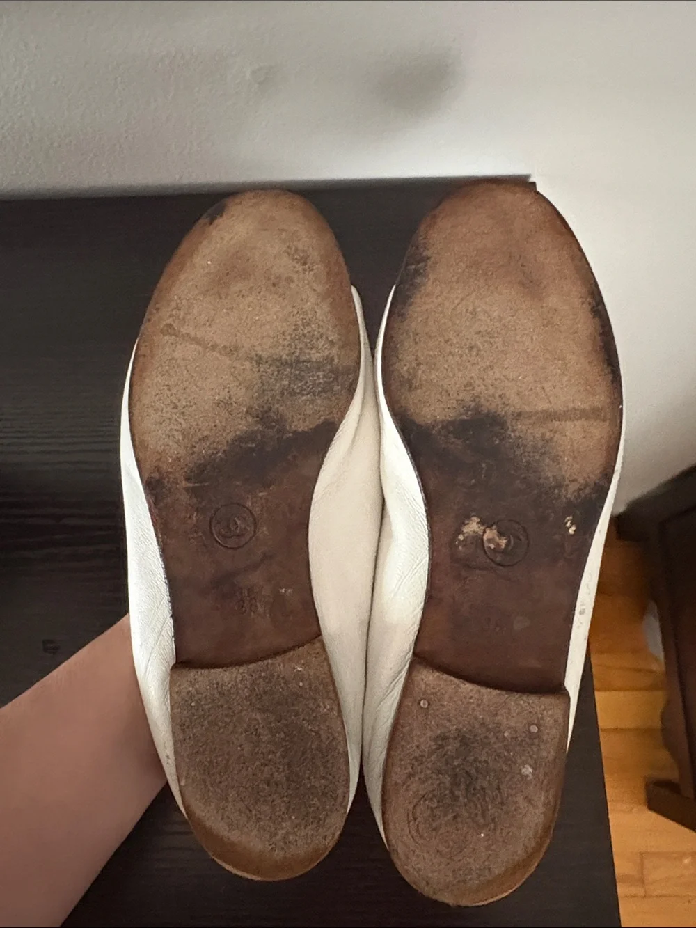 CHANEL White Leather Ballet Flats with Black Cap Toe and Bow